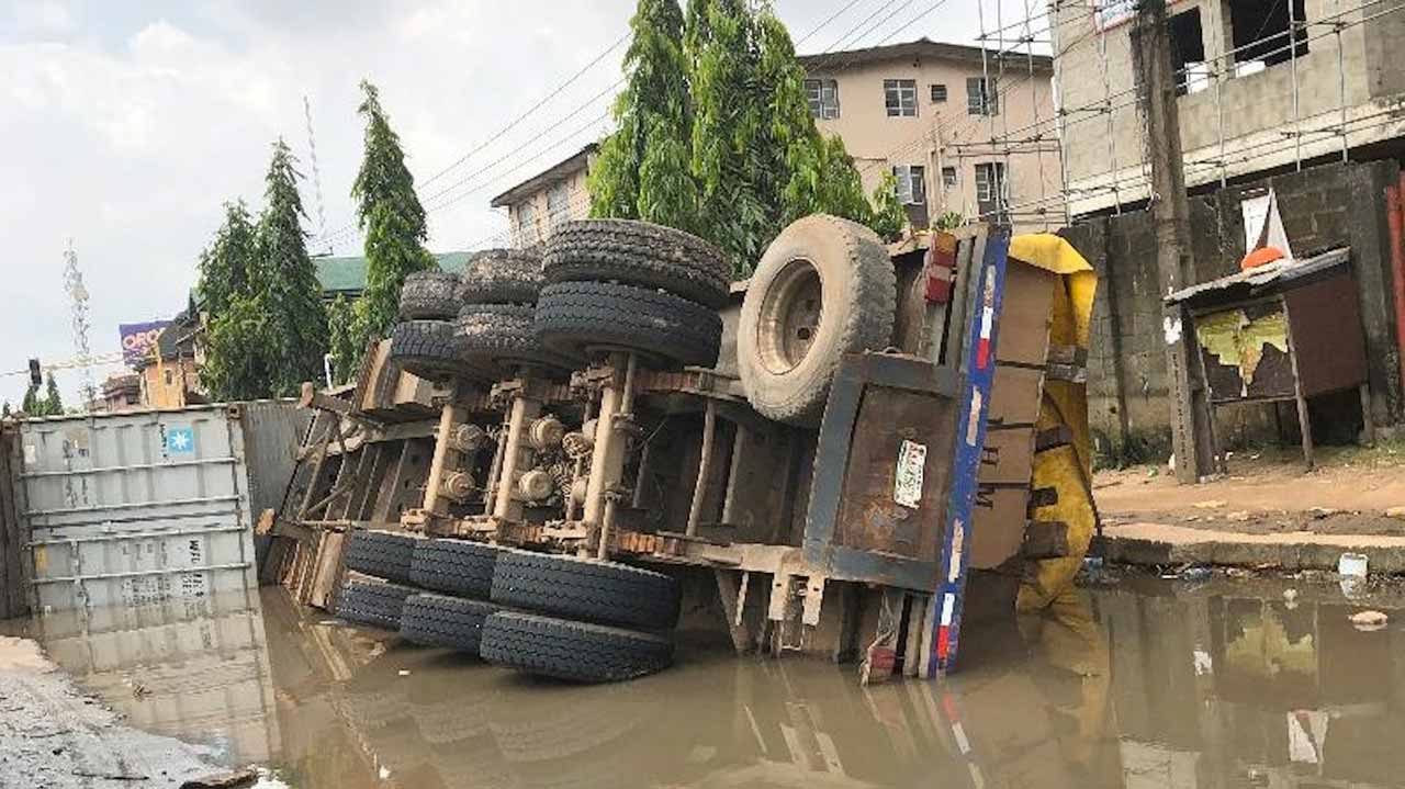 Terror As Trailers Fall Into Bad Spot On Agege Motor Road