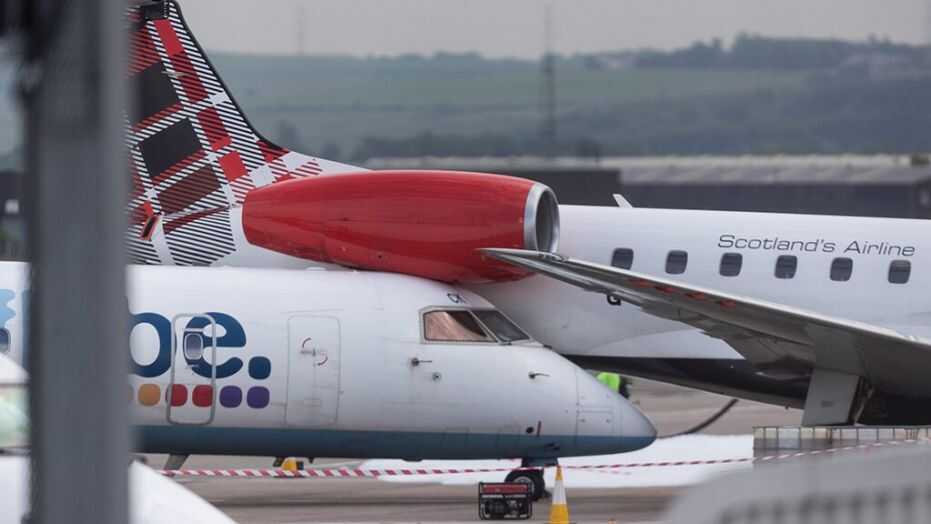 Planes Wedged Together After Collision At Aberdeen Airport