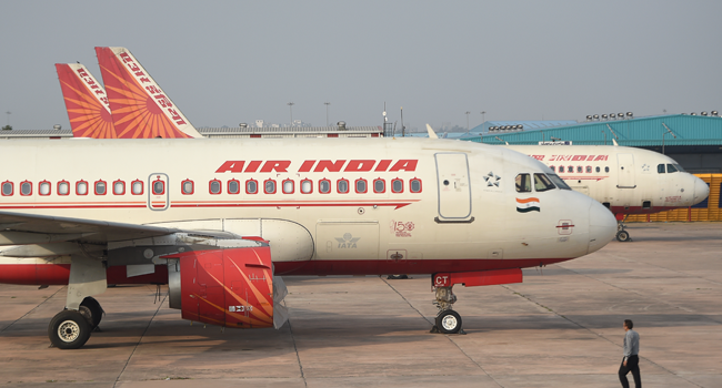 At Least 14 Dead After Indian Jet Skids Off Runway