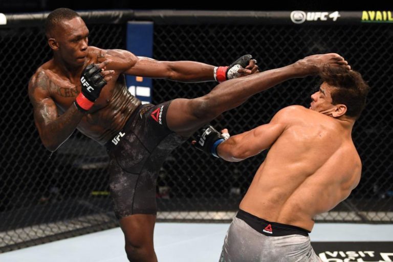 Israel Adesanya defeats rival Paulo Costa to retain UFC championship