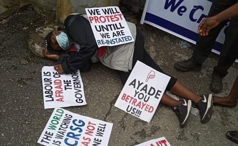 Woman Collapses While Protesting Against Her Sack By Cross River Govt