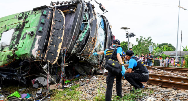 18 Dead In Thailand Bus-Train Collision
