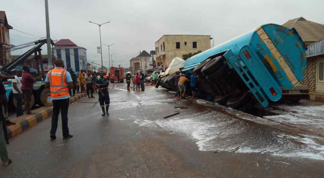 Residents Scoop Petrol From A Tripped Tanker In Lagos