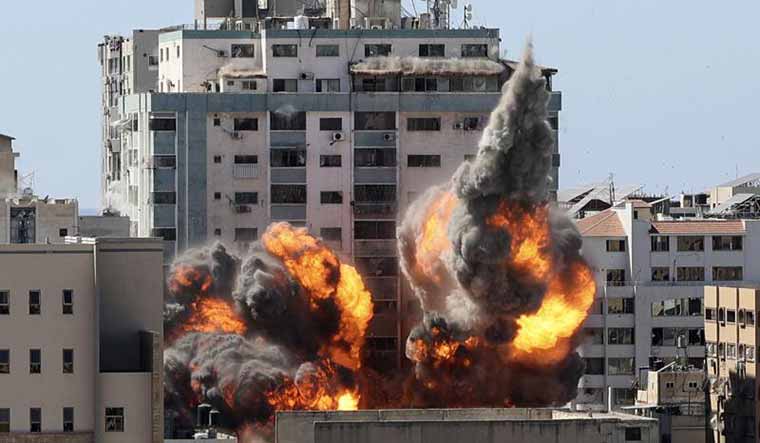 Israeli Air Strike Levels Gaza Building Hosting AP,