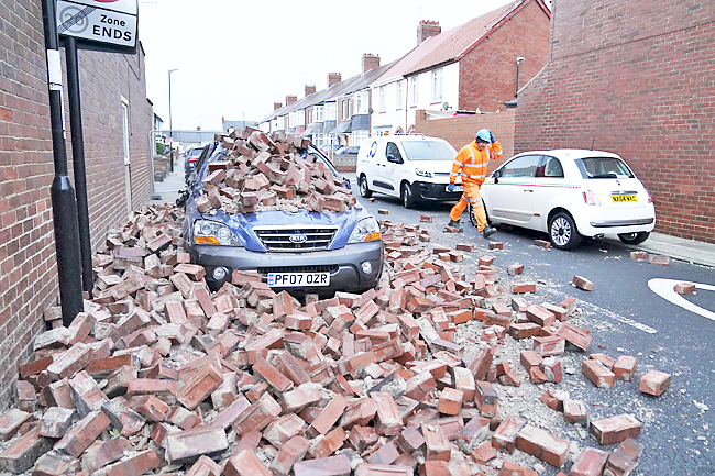 Two Dead As Powerful Storm Batters UK