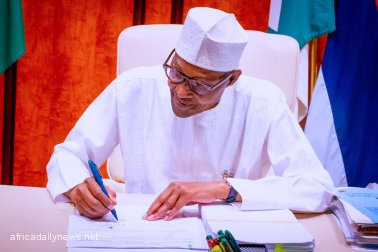 Buhari Signs Money Laundering, Terrorism Bills Into Law